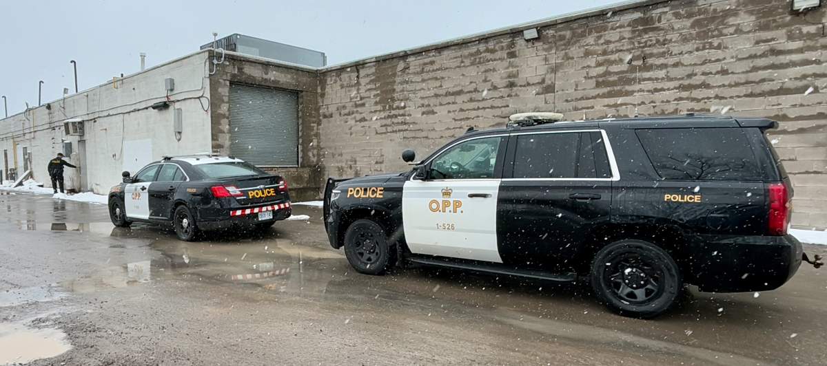 Peterborough County OPP at the rear of the plaza on April 4, 2024 investigating a break-in at the Guardian Pharmacy in Bridgenorth, Ont.