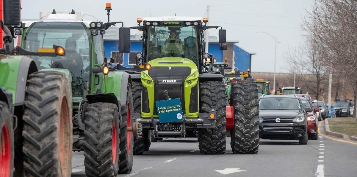 Hundreds of farmers drove their tractors and other farm vehicles through the Monteregie to Vaudreuil-Dorion creating traffic headaches west of Montreal on Wednesday, April 10, 2024.