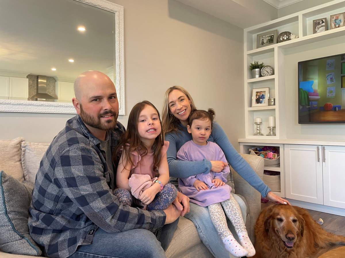 Carmen Doucette, founder of Her Yes Club, with husband, and two daughters.
