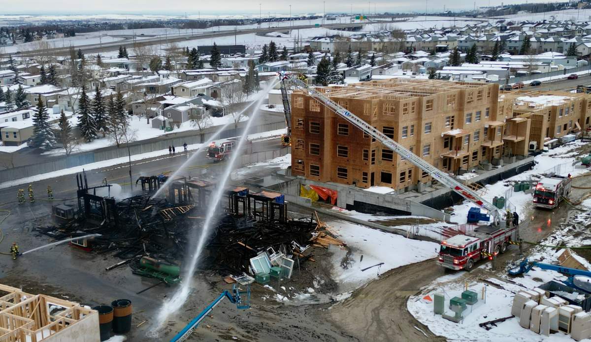 Fire crews are responding to a large fire that destroyed a building under construction in the northwest Calgary neighbourhood of Arbour Lake late Friday afternoon.