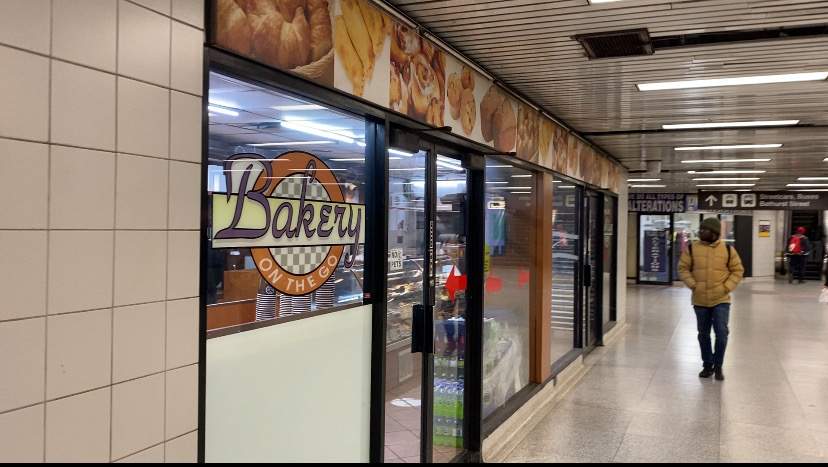 A passenger walks past Bakery on the Go at Bathurst Subway Station on April 2, 2024.