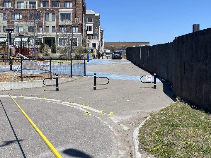 Police at the scene of a fatal shooting in the Long Branch Avenue and Lake Shore Boulevard West area.
