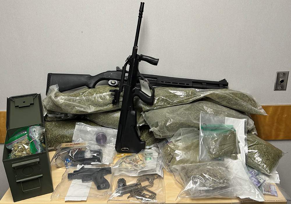 Two people were arrested after an RCMP weapons and drug bust in Lac do Bonnet, Man.