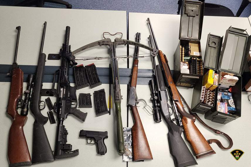 A harassment investigation has led to drug and weapons charges for a man from Lyndhurst, Ont.