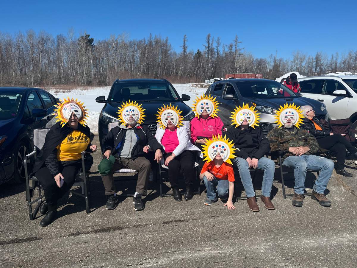 A gathering of solar eclipse watchers in Miramichi, N.B.