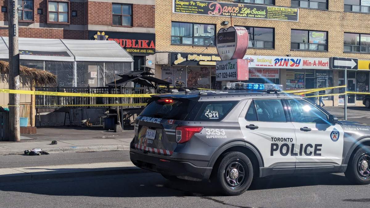 A police cruiser on the scene of a suspicious death near Bathurst Street and Wilson Avenue.