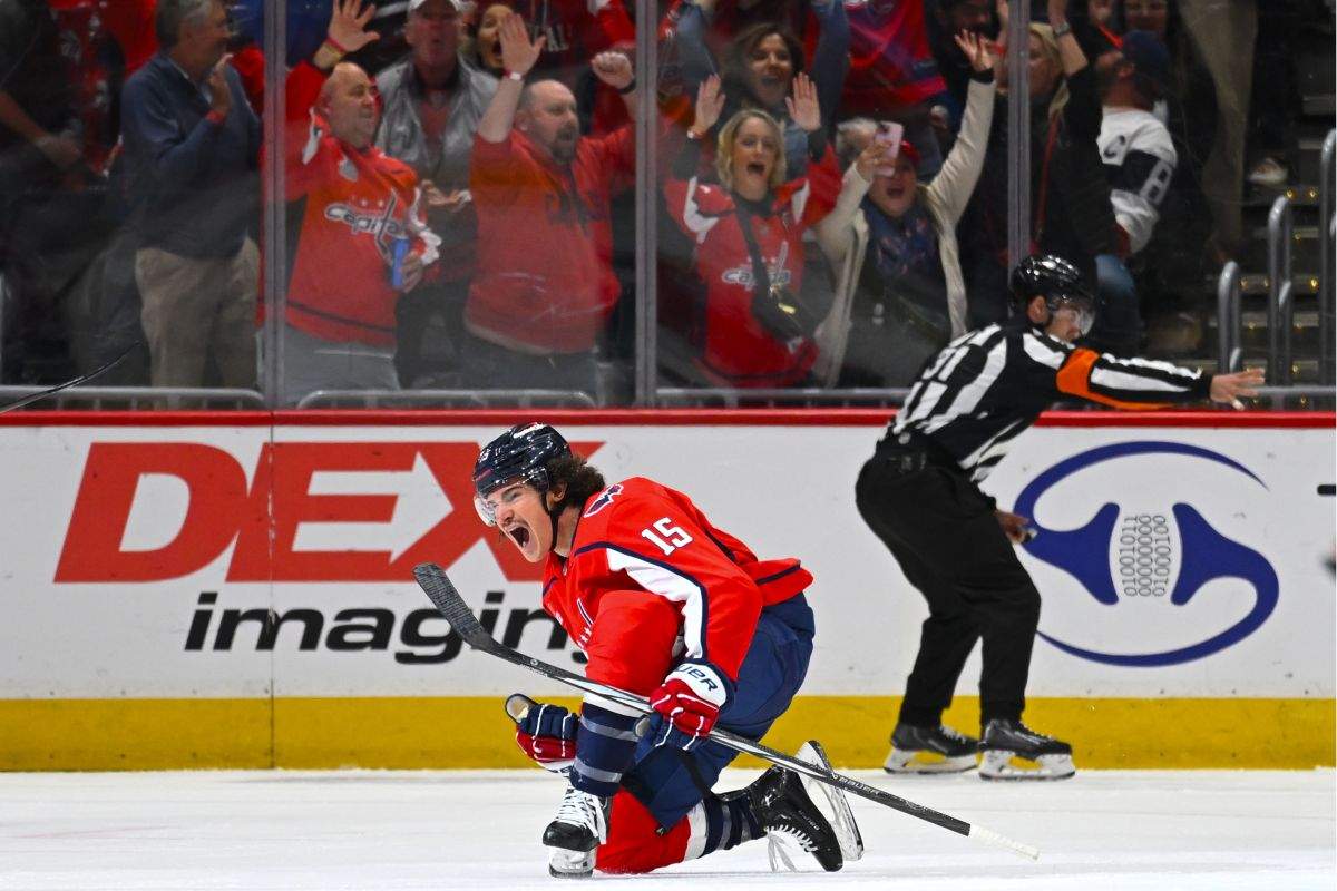 Washington Capitals left wing Sonny Milano (15) celebrates his first goal during the first period of an NHL hockey game against the Tampa Bay Lightning, Saturday, April 13, 2024, in Washington.