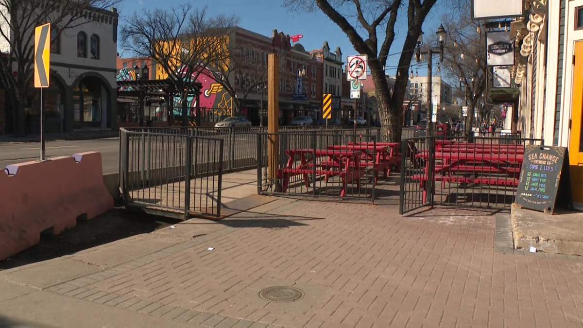 The boardwalk sidewalk going around the patio at Leopold's Tavern on Whyte Avenue on Monday, April 1, 2024.