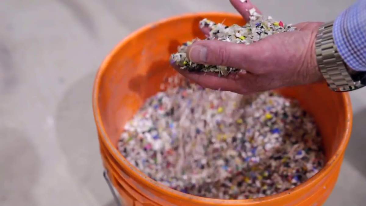 Recycled plastic bits in a promotional video from Sustane Technologies Inc.