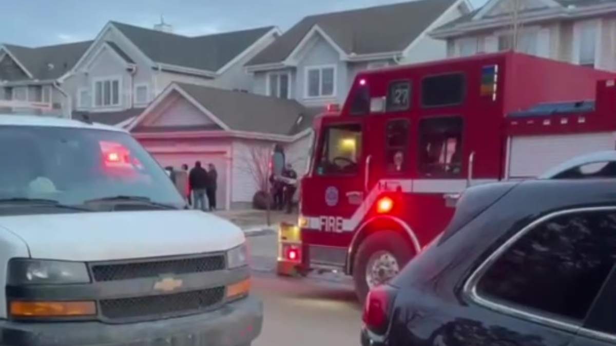 Edmonton first responders at a home near 82 Street and 11 Avenue SW in Summerside, where a child was fatally attacked by dogs on Monday, April 1, 2024.