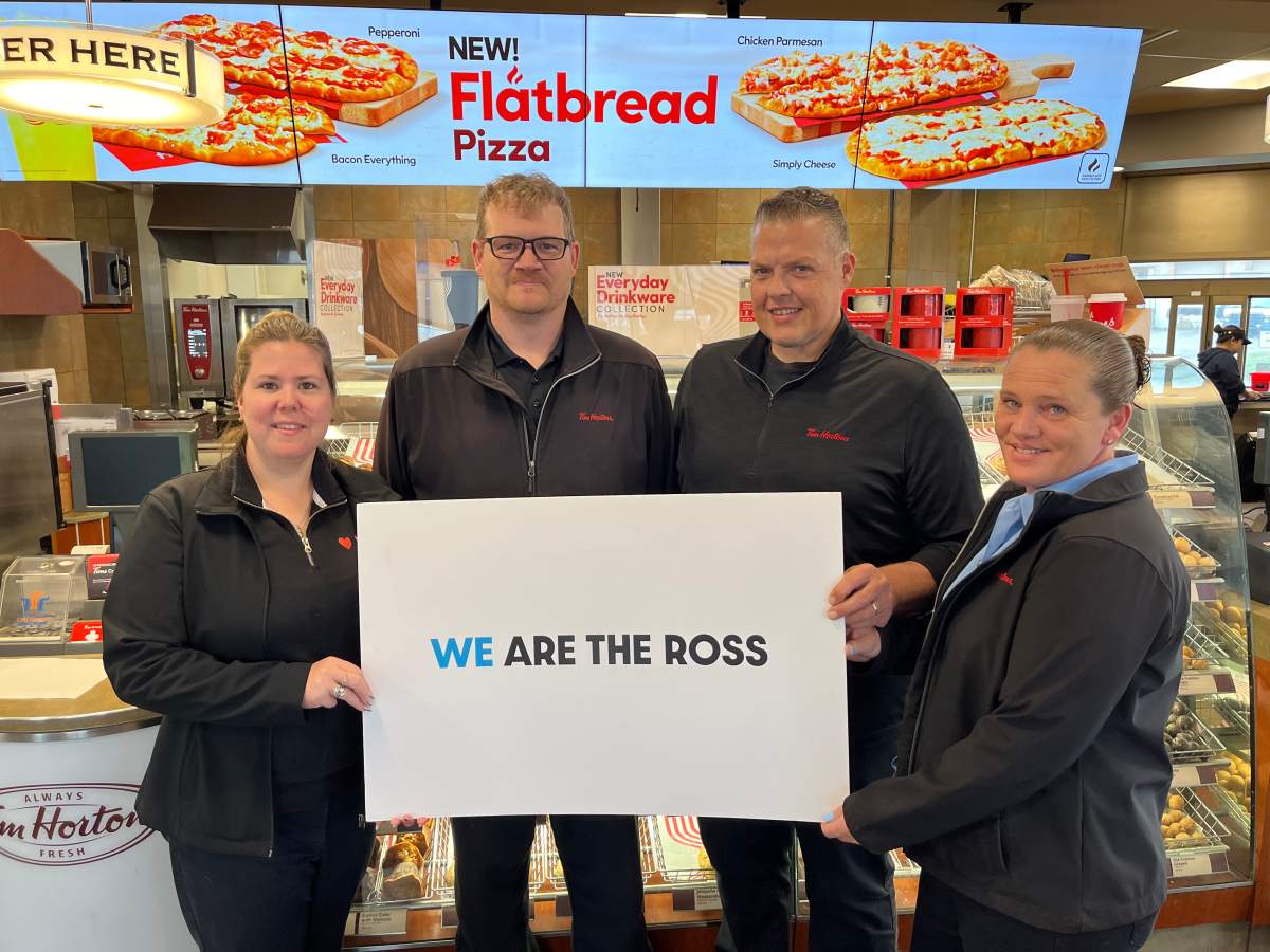 The Smile Cookie campaign at five Tim Hortons restaurants in Lindsay, Ont., will support the Ross Memorial Hospital Foundation and Kawartha Lakes Food Source. Taking part in the announcement were, from left, restaurants owners Meaghan and Nick Chapman, Mark Hutchinson, operations manager, and general manger Nancy Hutchinson.
