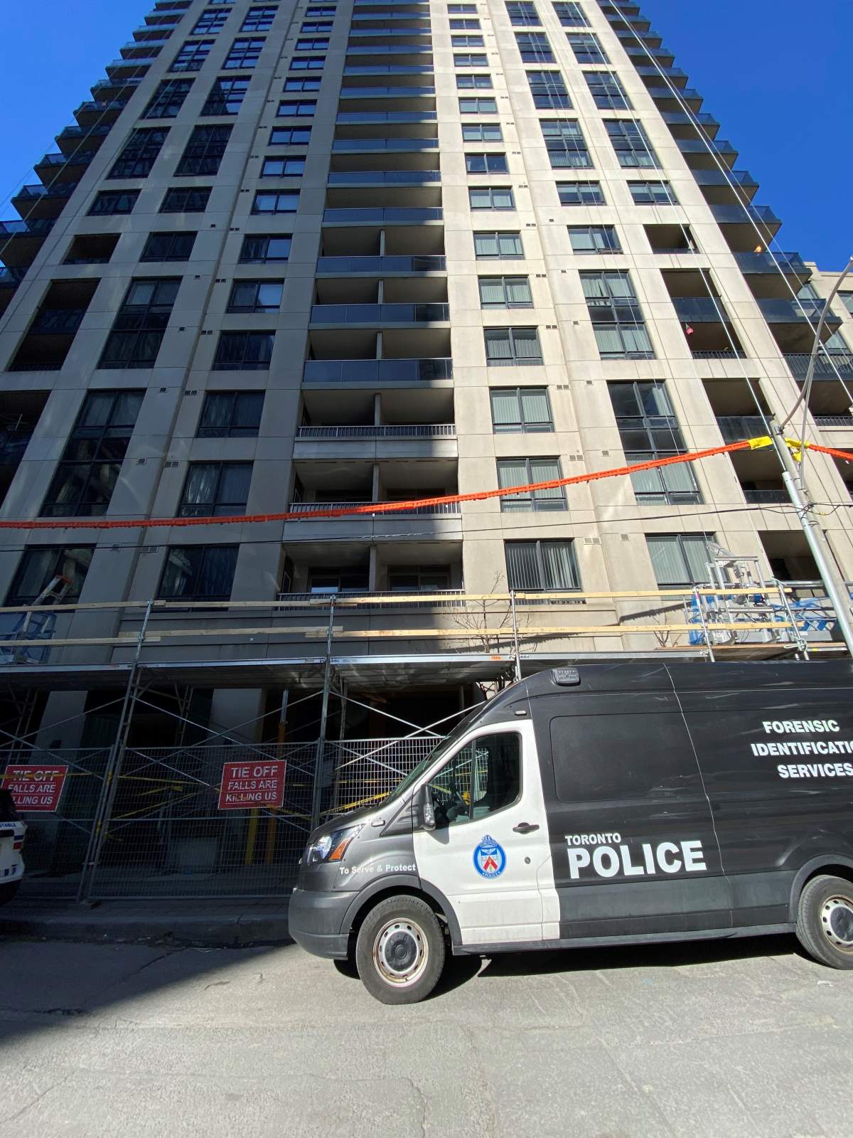 Police investigating after a man was pushed from a Toronto balcony and died in hospital.
