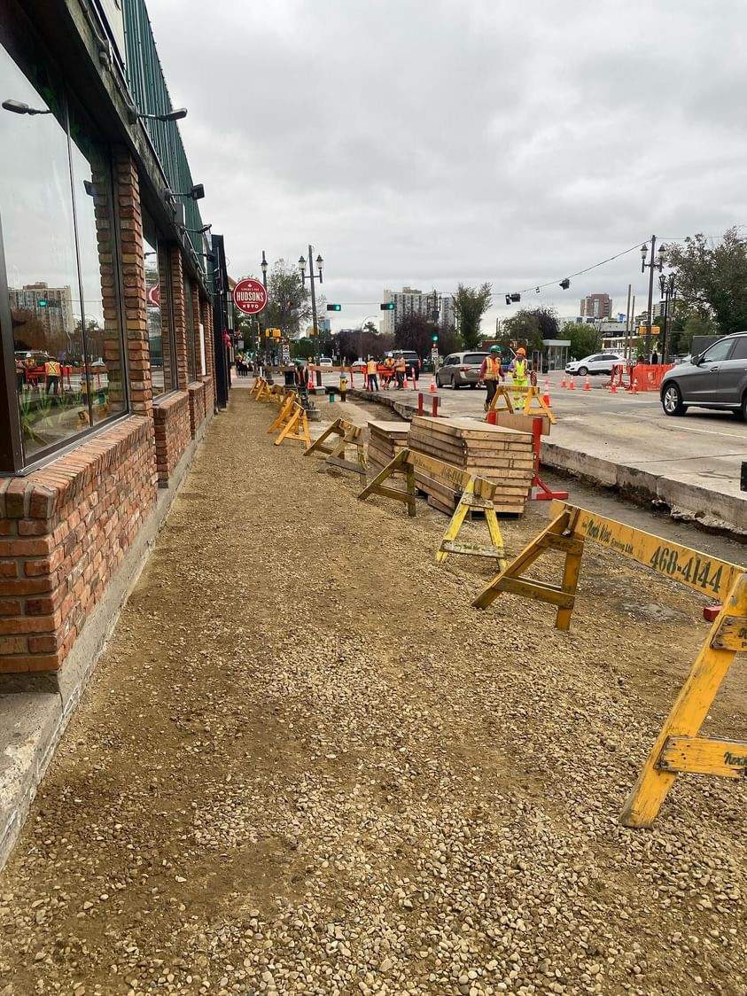 Sidewalk construction along Hudsons Canada's Pub on Whyte Avenue.