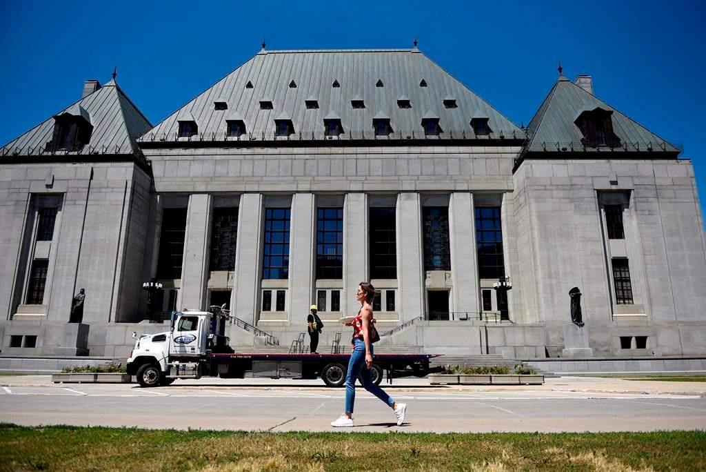 The Supreme Court of Canada has dismissed a bid by the City of Saint John to overturn a lower court ruling that found the city vicariously liable for the sexual abuse of children by a member of the Saint John Police Force. The Supreme Court of Canada building is seen in Ottawa, on Thursday, June 17, 2021. THE CANADIAN PRESS/Justin Tang.