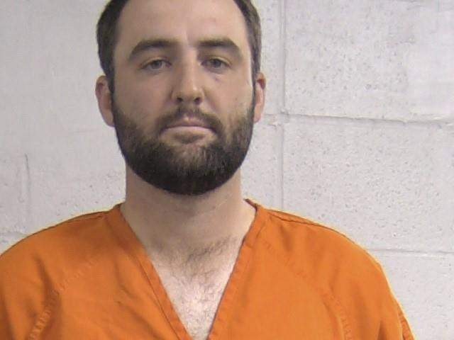 In this mug shot provided by the Louisville Metropolitan Department of Corrections Friday, May 17, 2024, Scott Scheffler is shown. Masters champion Scottie Scheffler was detained by police Friday morning on his way to the PGA Championship, with stunning images showing him handcuffed as he was led to a police car.