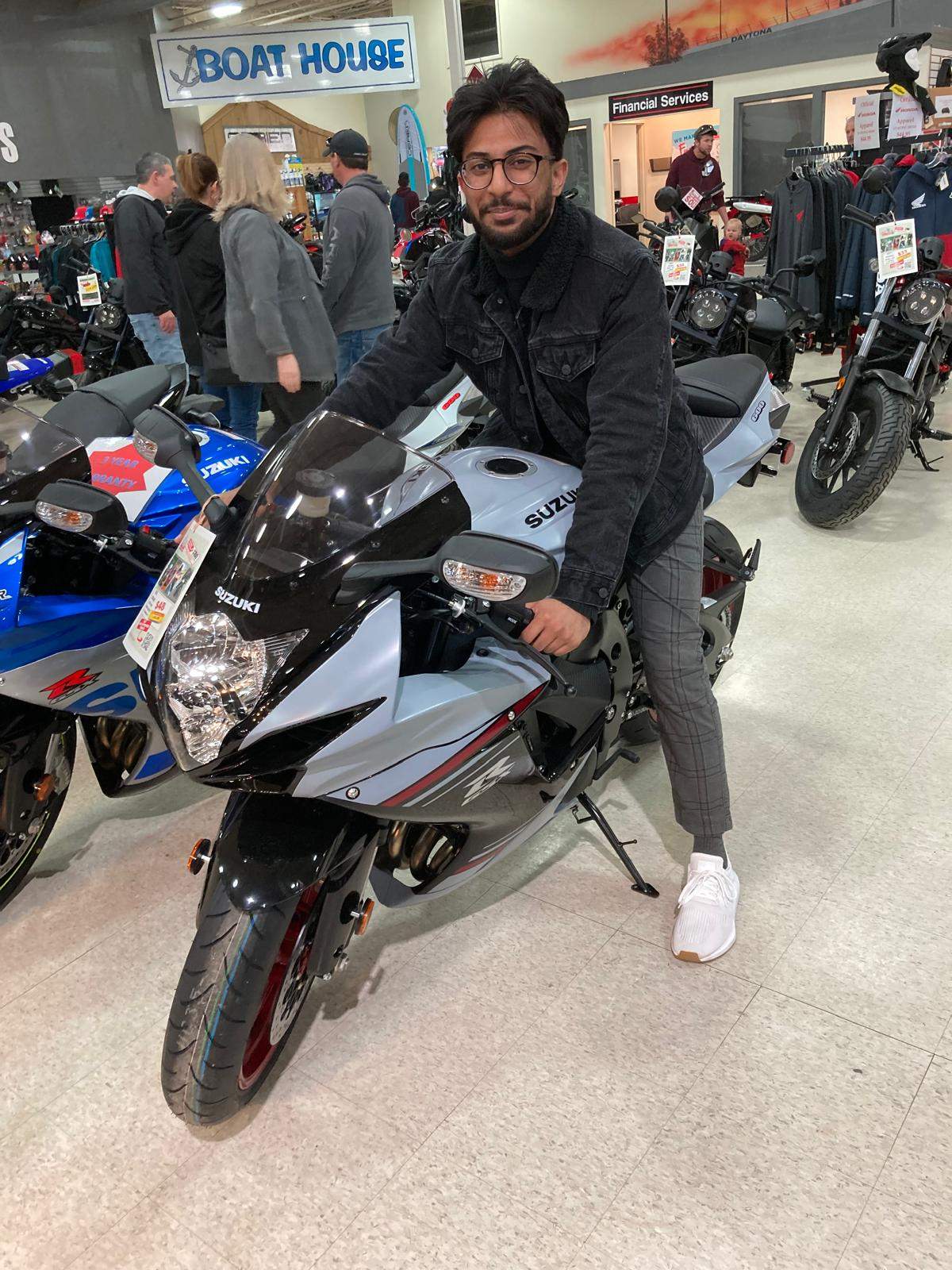 Ali Hashmat pictured in 2018 before purchasing his first motorcycle, a Suzuki GSX-R600.