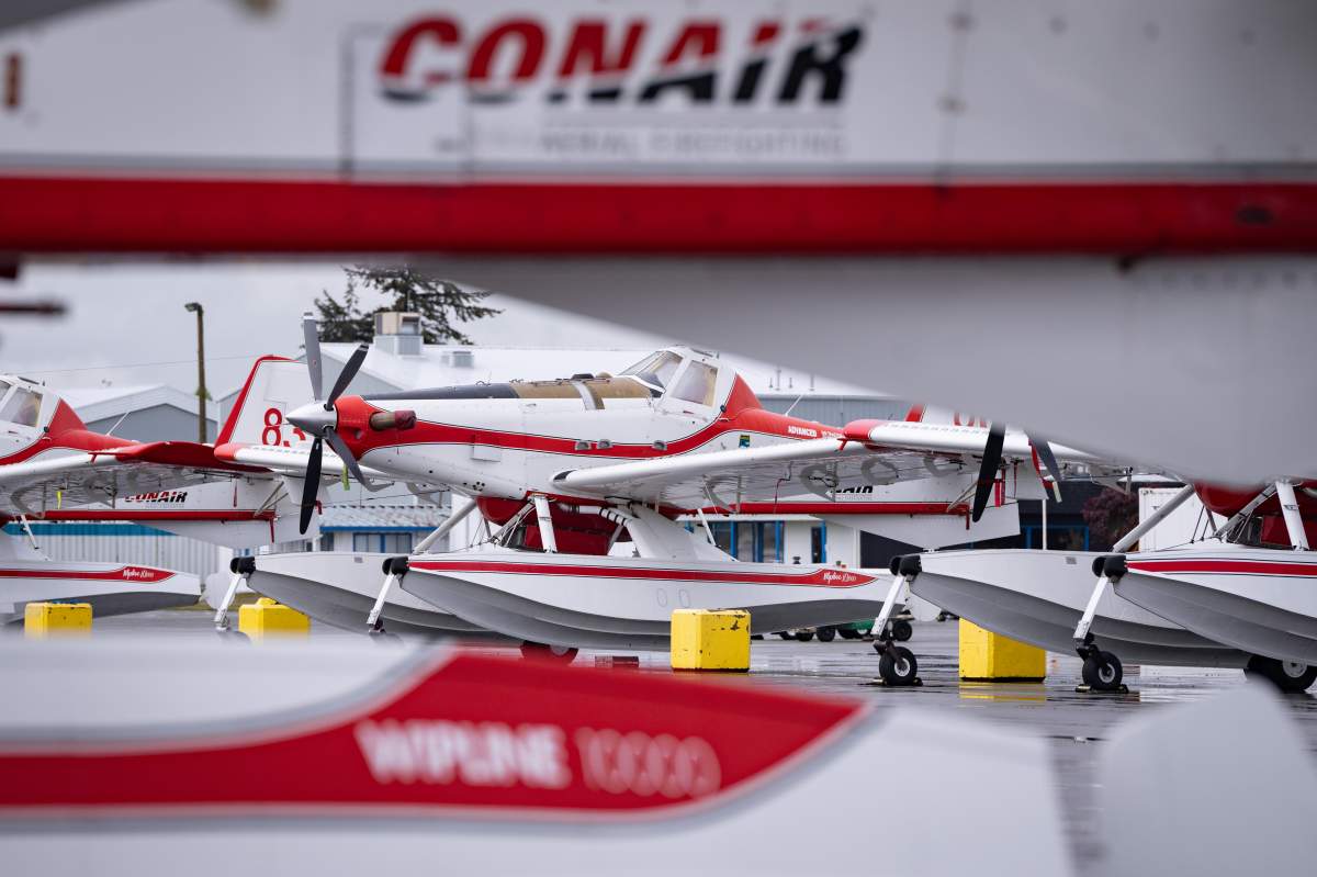 Conair Air Tractor AT802 Fire Bosses are parked on the tarmac in Abbotsford, B.C., Friday, April. 26, 2024. THE CANADIAN PRESS/Ethan Cairns