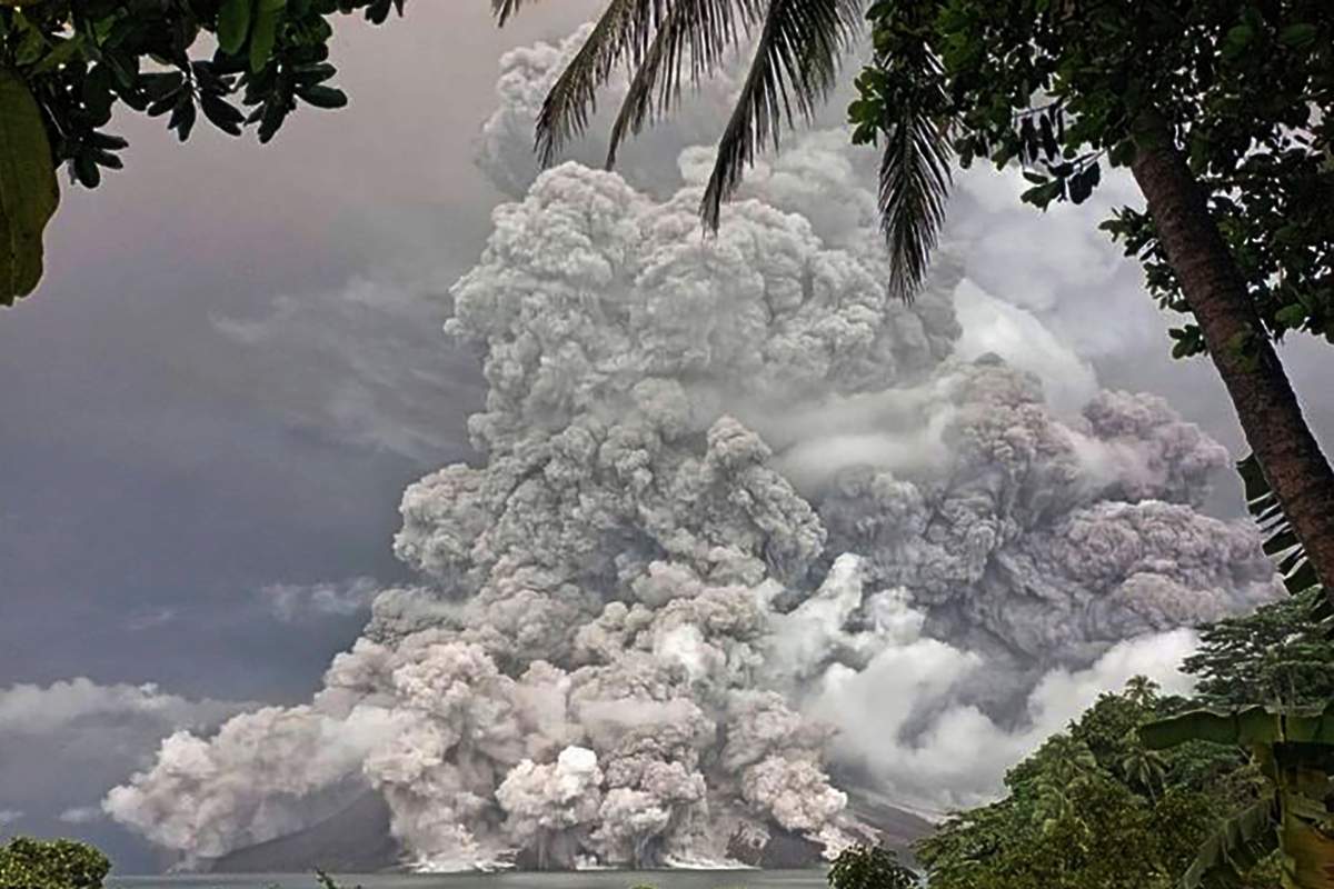 Indonesia's Mount Ruang volcano erupted Tuesday for a second time in two weeks, spewing ash almost 2 kilometres into the sky, closing an airport and peppering nearby villages with debris.