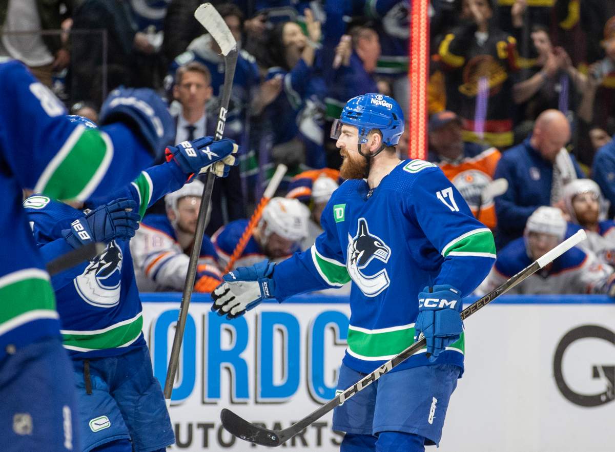 Filip Hronek #17 of the Vancouver Canucks celebrates his goal with teammates during the third period in Game Seven of the Second Round of the 2024 Stanley Cup Playoffs at Rogers Arena on May 20, 2024 in Vancouver, British Columbia, Canada.