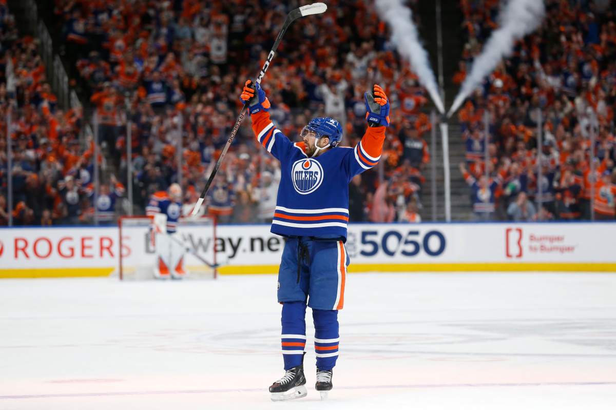 Evan Bouchard of the Edmonton Oilers celebrates a goal during the second period against the Vancouver Canucks in Game Six of the Second Round of the 2024 Stanley Cup Playoffs at Rogers Place on May 18, 2024 in Edmonton.