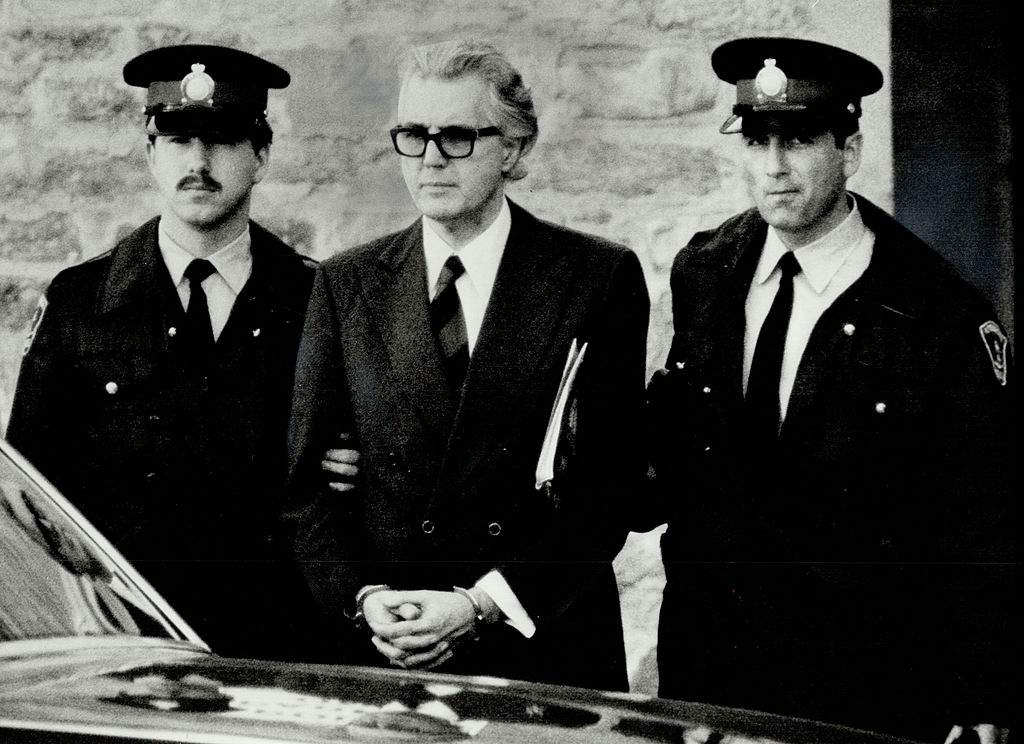Peter Demeter is seen being escorted by police officer during the trial where he was ultimately found guilty for plotting to kill his nephew.