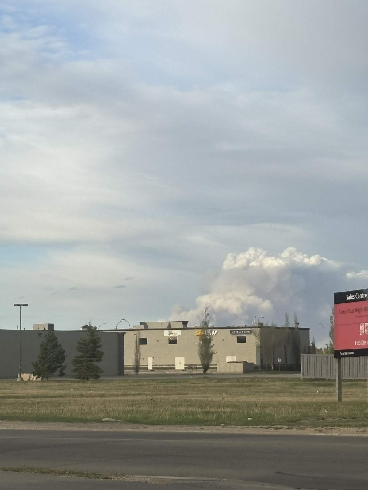 The smoke cloud from Grande Prairie about 20 minutes away from the fire.