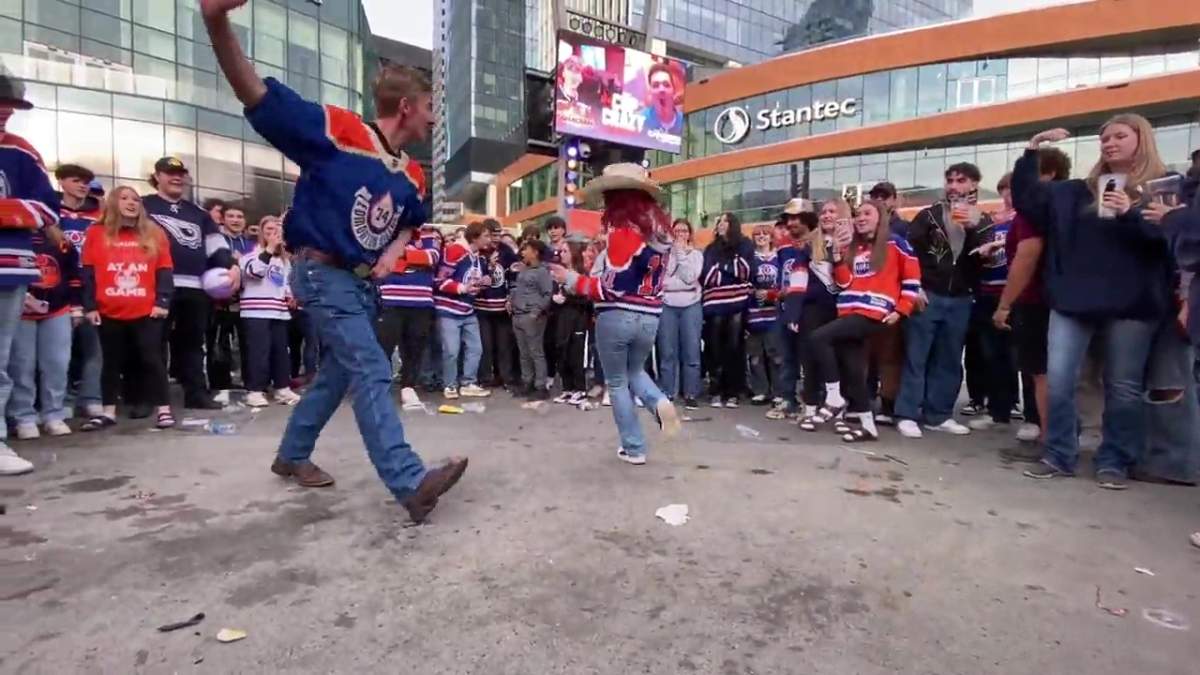 Dancing Edmonton Oilers fan Izack Hodgins at the Ice District Plaza on Thursday, May 24, 2024.