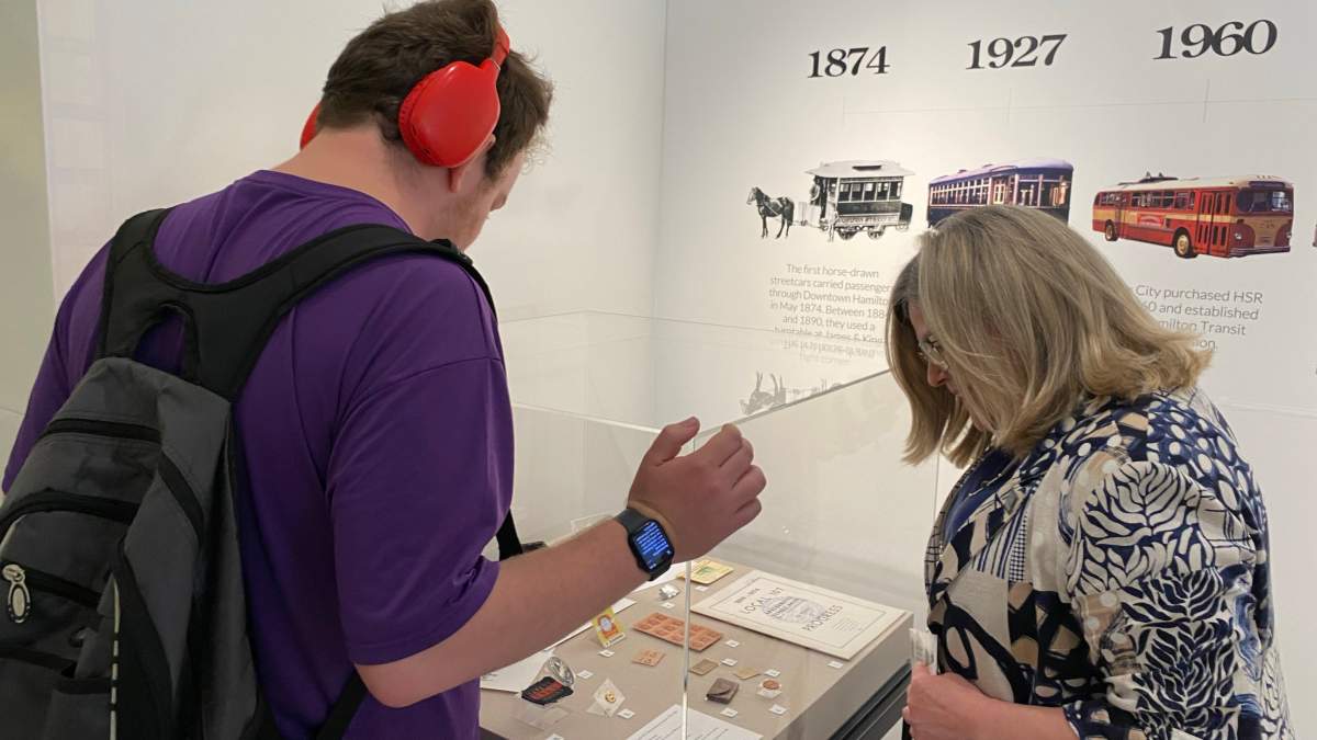 Mayor Horwath checks out an HSR display at the visitor centre in Lister Block in Hamilton, Ont.