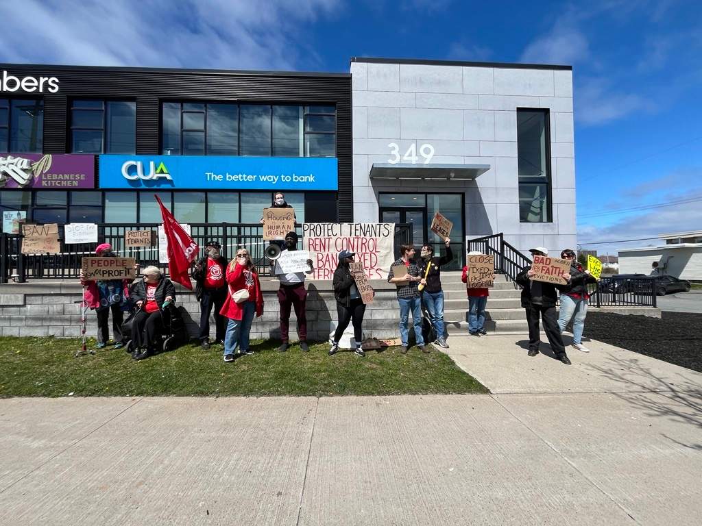 Housing advocates rally outside Brendan Mcguire’s constituency office on Friday.
