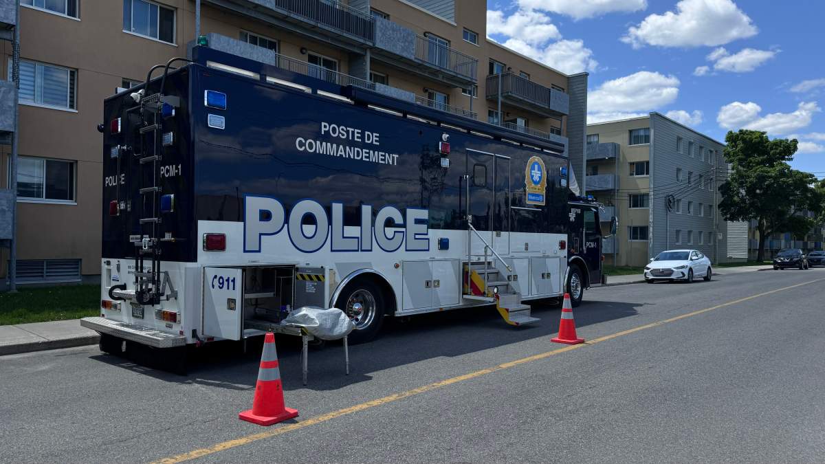 Montreal police set up a command post on Thursday, May 30 2024 after a man was gunned down on a basketball court.