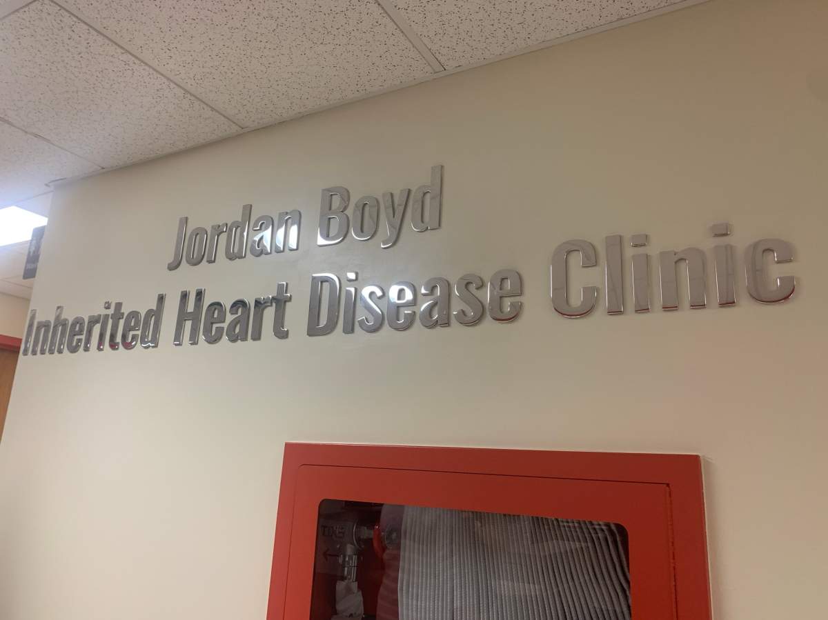 The sign for the newly renamed Jordan Boyd Inherited Heart Disease Clinic was unveiled in front of Boyd’s family members on Thursday.