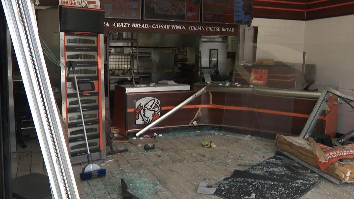 No injuries were reported when a vehicle crashed into Little Caesars Pizza at 18 Panatella Blvd. Northwest in Calgary Thursday, May 16, 2024.