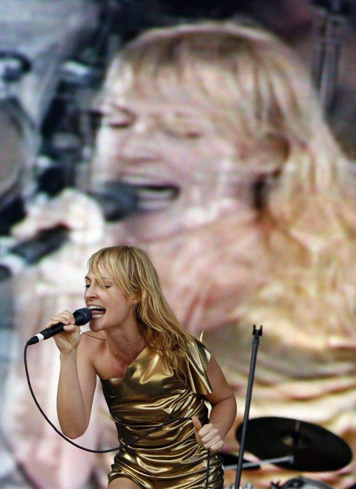 FILE--Emily Haines of Metric performs during the All Points West music festival at Liberty State Park Saturday, Aug. 9, 2008 in Jersey City, N.J.