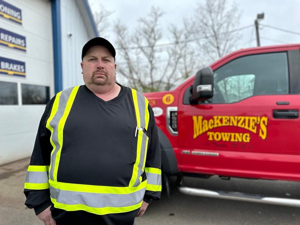 Jason Beaton's tow truck was struck on Highway 102 in Truro, N.S. while he was assisting a driver.