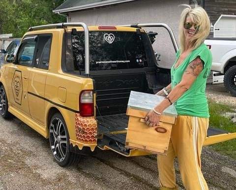Rebecca Krowelski with her honeybees.