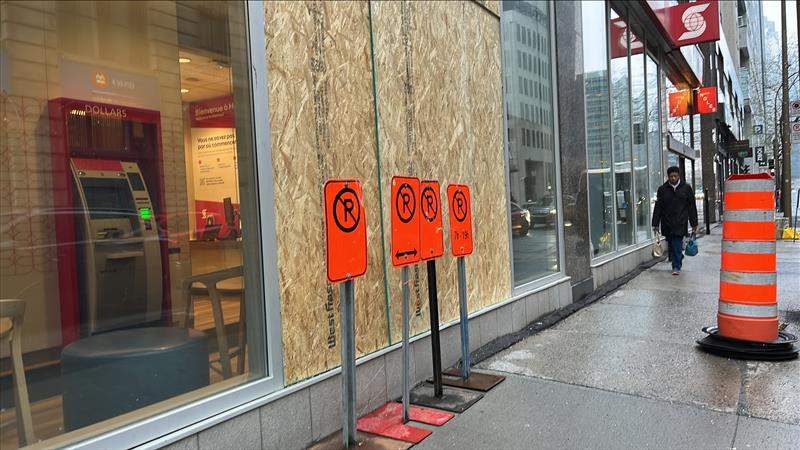 A boarded up window of a Scotiabank in downtown Montreal.