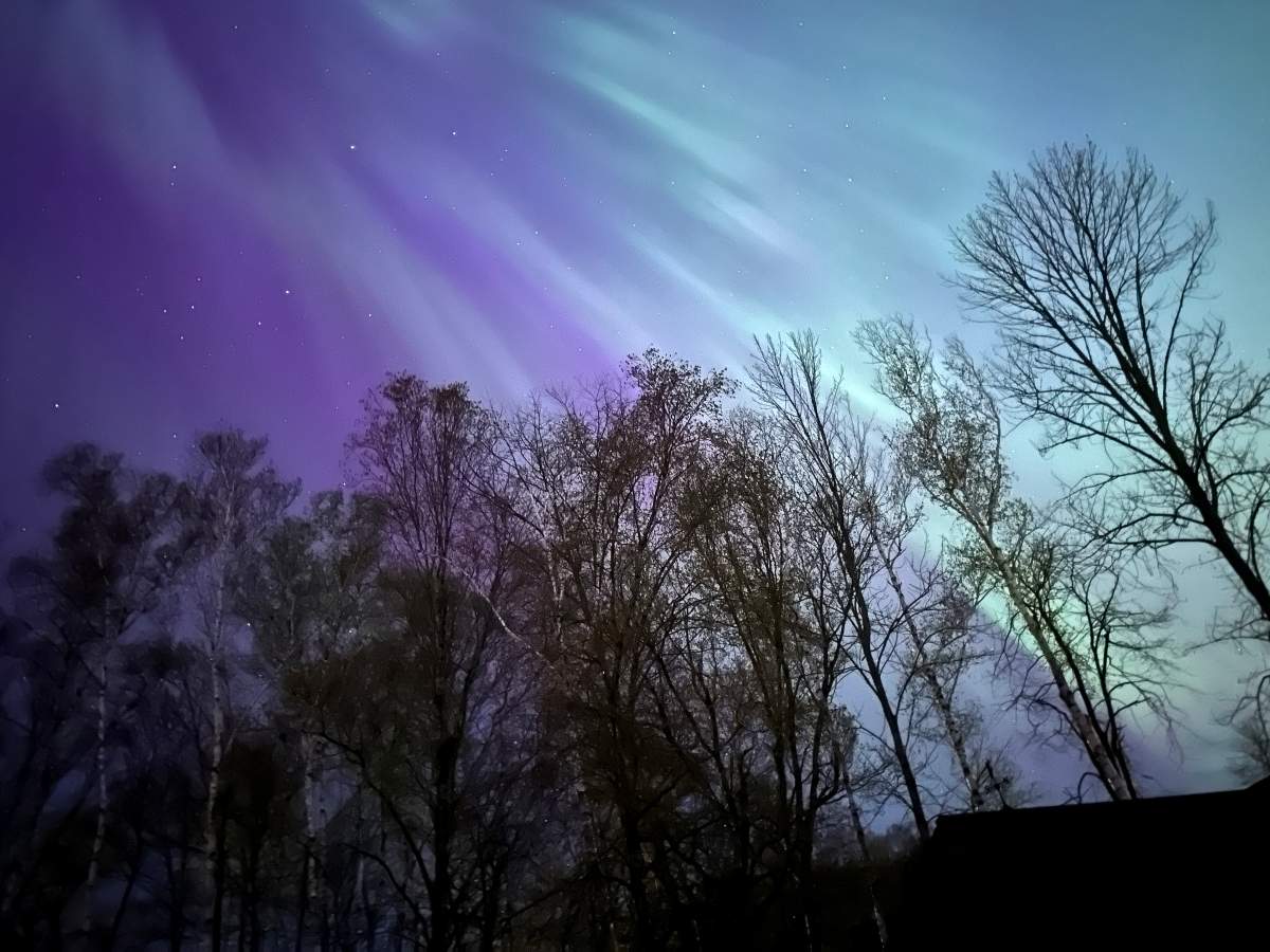 Aurora borealis or the northern lights are seen in Fredericton, on Saturday, May. 11, 2024. Space Weather Canada warned the public that a “major geomagnetic storm” alert was in effect Friday, which might cause “ionospheric disturbances,” and was expected to continue into early Saturday as a series of strong solar particle releases reach the Earth. THE CANADIAN PRESS/Hina Alam