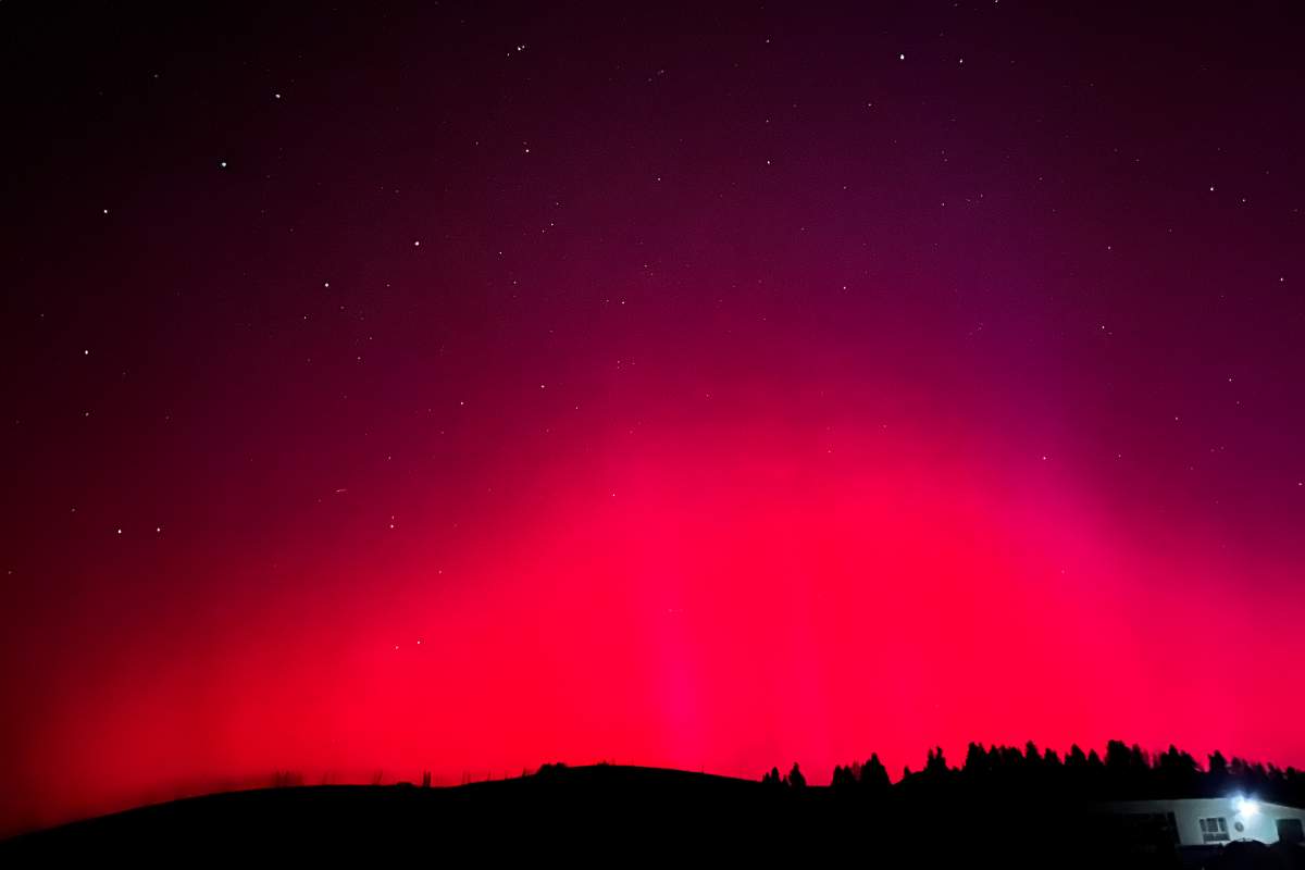 In this photo released by Xinhua News Agency, the northern lights, or aurora borealis, are seen near Nanshan scenic spot in Urumqi in northwestern China’s Xinjiang Uyghur Autonomous Region, Saturday, May 11, 2024. An unusually strong solar storm hitting Earth produced stunning displays of color in the skies across the Northern Hemisphere early Saturday, with no immediate reports of disruptions to power and communications. (Chen Shuo/Xinhua via AP)