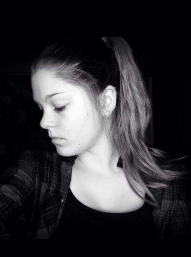 A black and white photo of a woman's profile.