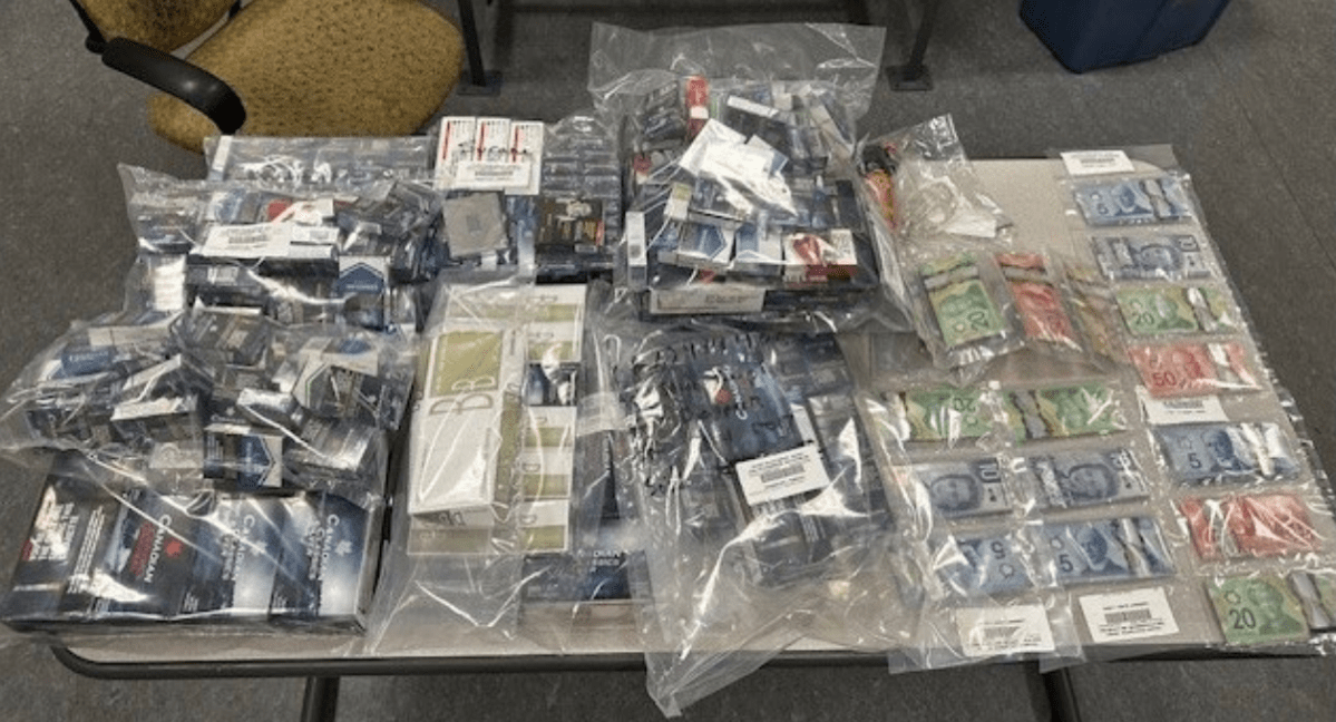 Cigarettes, and cash were among the items seized by Calgary police in an investigation into the trafficking of contraband cigarettes.