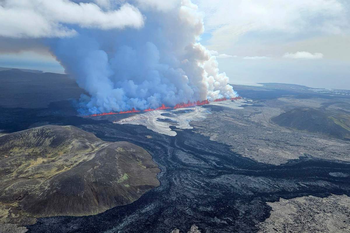 A volcano erupts in Grindavik, Iceland, Wednesday, May 29, 2024. Wednesday, May 29, 2024. A volcano in southwestern Iceland is erupting, spewing red streams of lava in its latest display of nature’s power. A series of earthquakes before the eruption Wednesday triggered the evacuation of the popular Blue Lagoon geothermal spa. The eruption began in the early afternoon north of Grindavik, a coastal town of 3,800 people that was also evacuated. (Birn Oddsson/Iceland Civil Defense via AP)
