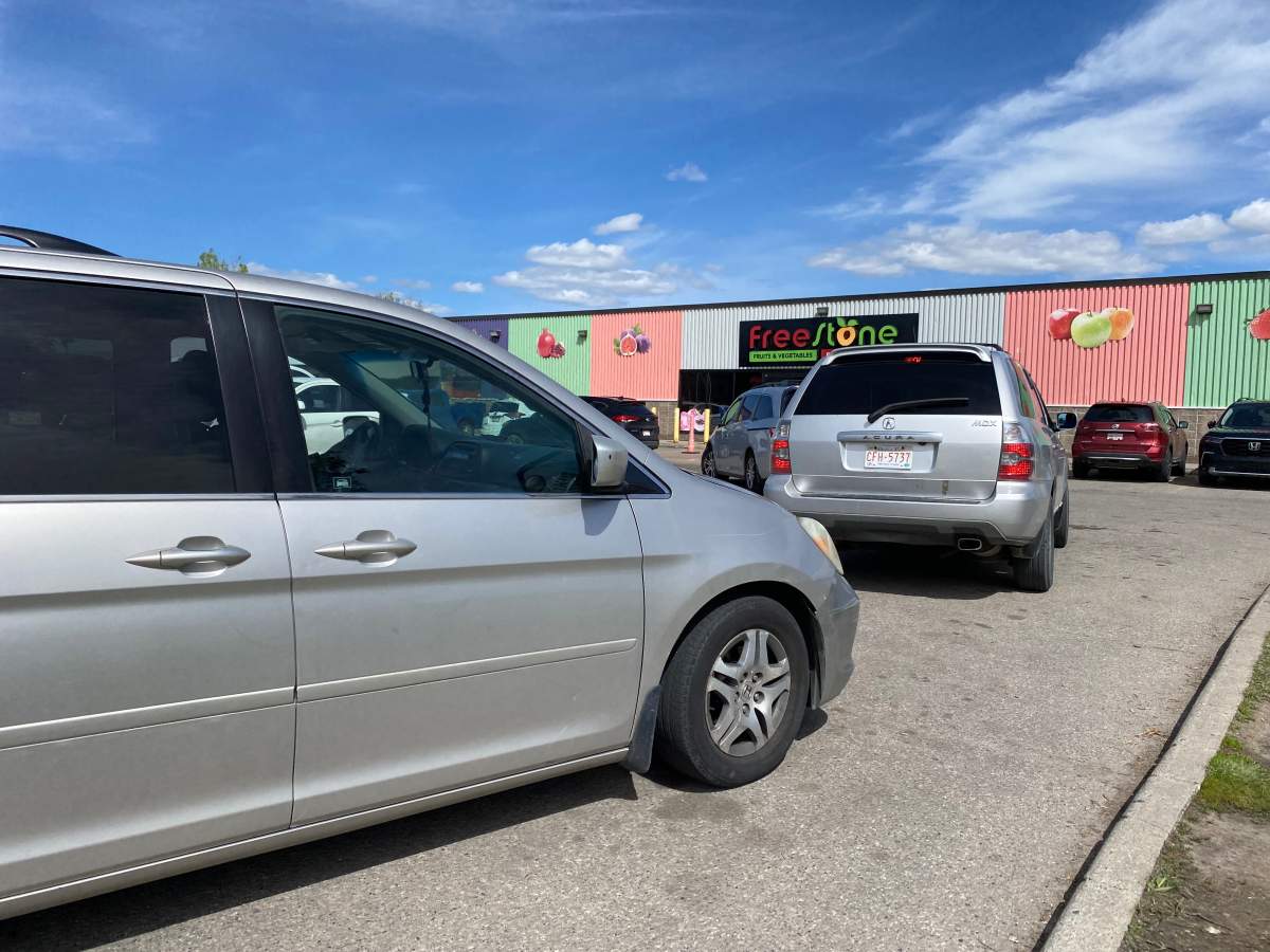 Parking jam in front of Freestone Produce