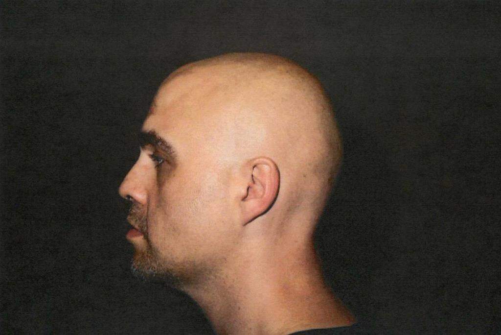 Jeremy Skibicki is shown in this undated handout photo, taken by police while in custody, provided by the Court of King's Bench. The admitted serial killer's mental state is expected to be the focus of his murder trial that resumes in Winnipeg on Monday.