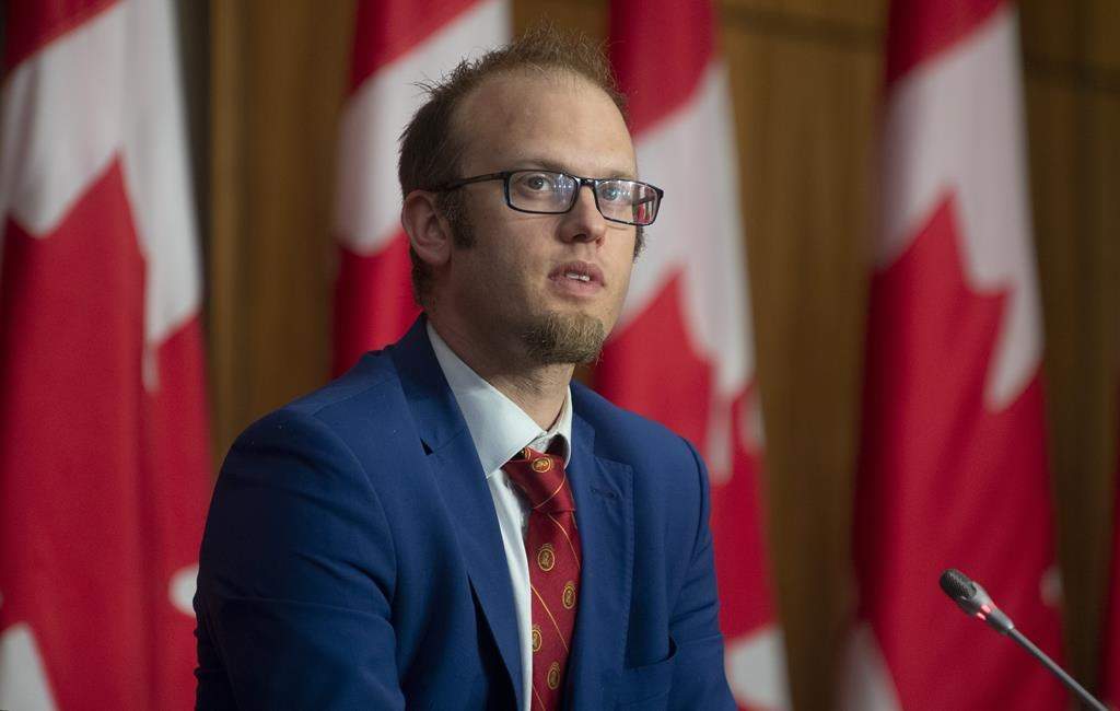 Arnold Viersen listens to a speaker during a news conference in Ottawa, Thursday, May 27, 2021.