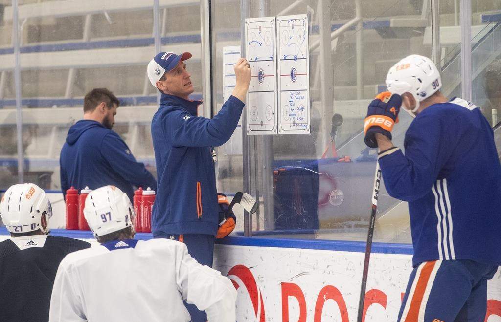 Edmonton Oilers head coach Kris Knoblauch directs practice before taking on the Florida Panthers in the NHL Stanley Cup playoffs, in Edmonton, Wednesday, June 5, 2024.