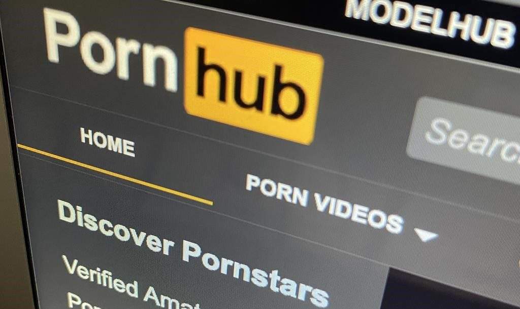 The Pornhub website is shown on a computer screen in Toronto on Wednesday, Dec. 16, 2020. Federal New Democrats won't state their position on a bill that seeks to keep minors from accessing sexually explicit material online. THE CANADIAN PRESS.