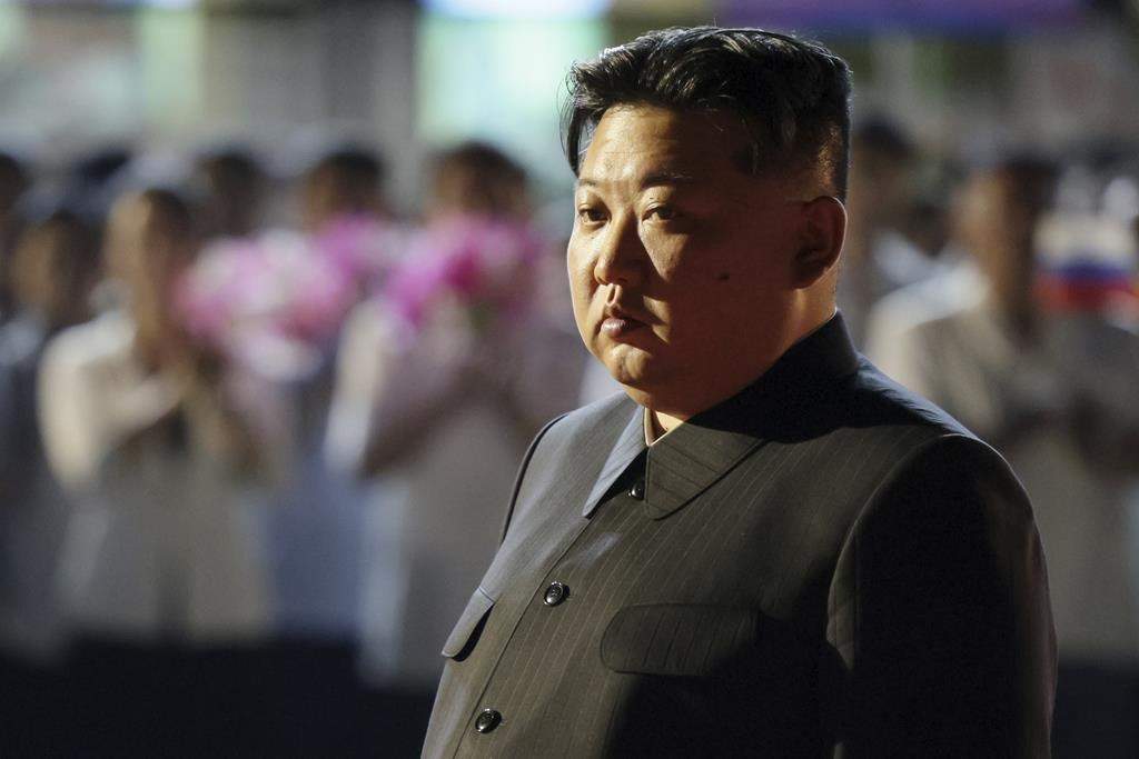 North Korea's leader Kim Jong Un stands during the departure ceremony of Russian President Vladimir Putin at an international airport outside Pyongyang, North Korea, on Wednesday, June 19, 2024.