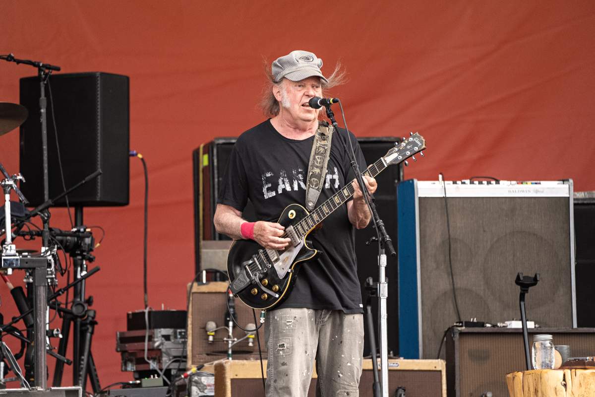 Neil Young, of Crazy Horse, performs during the New Orleans Jazz & Heritage Festival, Saturday, May 4, 2024, at the Fair Grounds Race Course in New Orleans.
