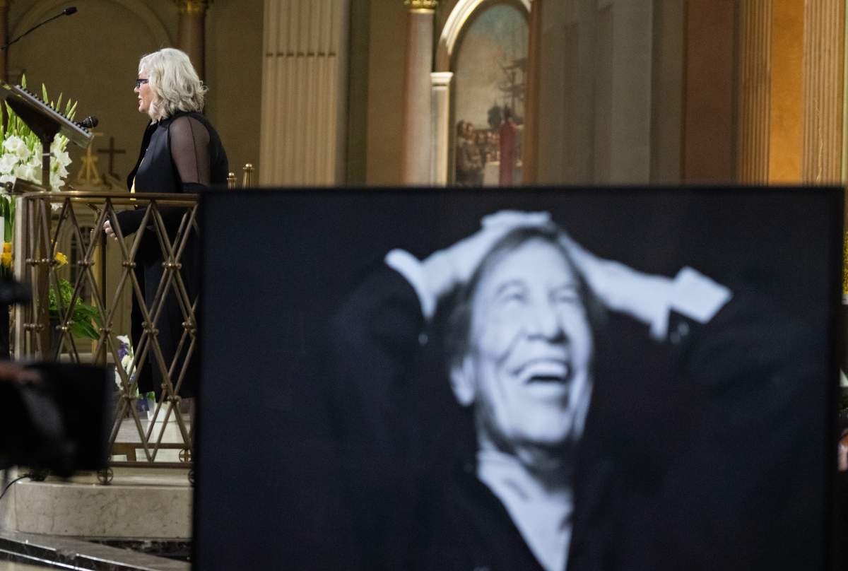 Julie-Anne Saumur, speaks during the national funeral of her husband Quebec singer Jean-Pierre Ferland at Mary Queen of the World Cathedral in Montreal, Saturday, June 1, 2024.