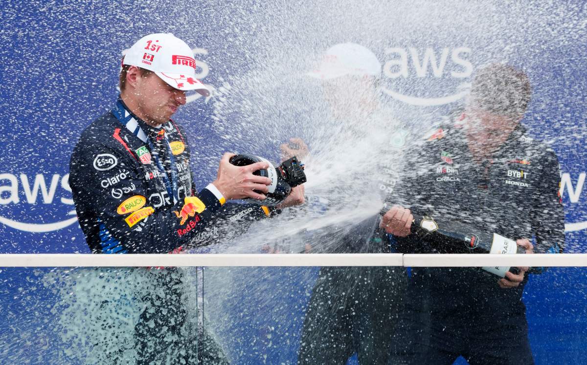 Red Bull Racing driver Max Verstappen of the Netherlands is sprayed with champagne as he celebrates his victory at the Canadian Grand Prix Formula 1 car race, in Montreal, Sunday, June 9, 2024.